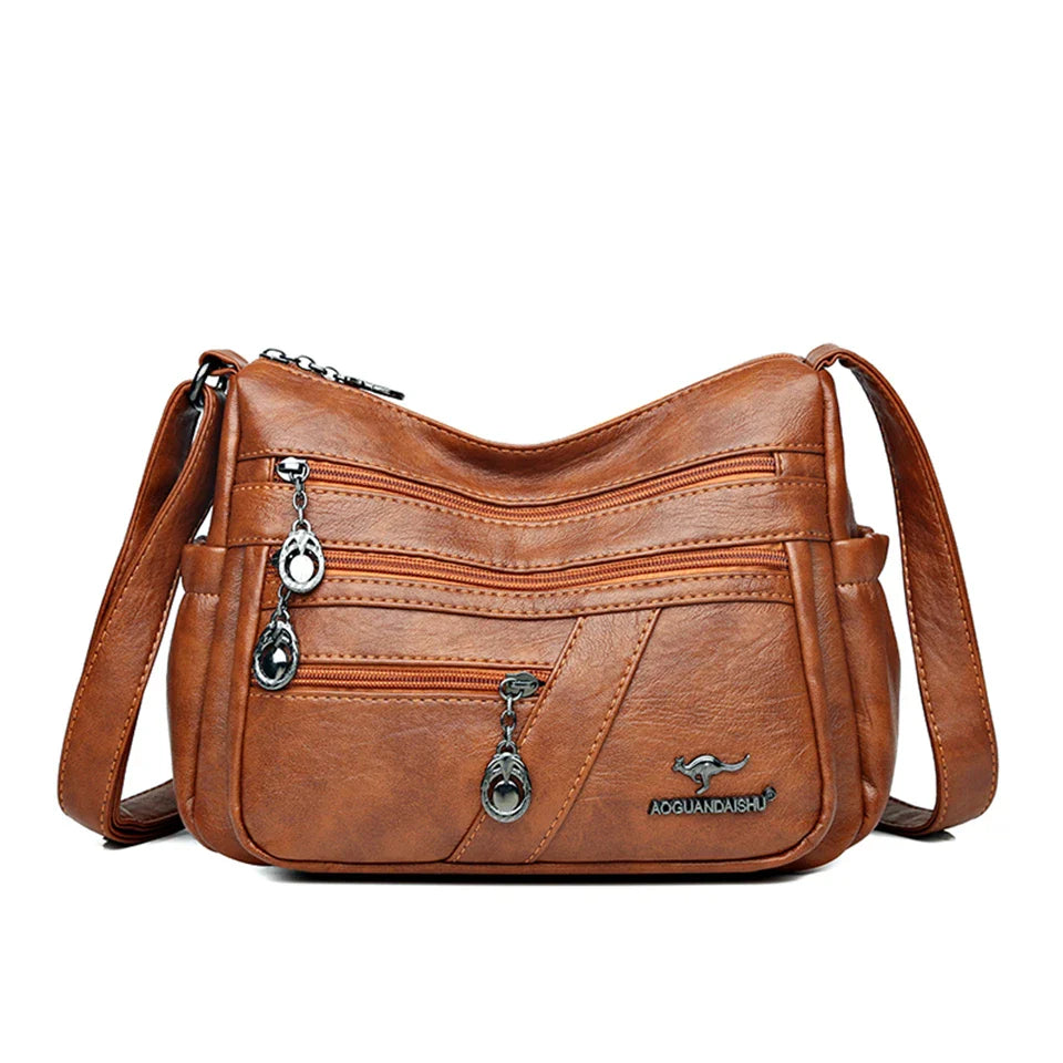 Bolso bandolera de piel sintética suave - Multibolsillo